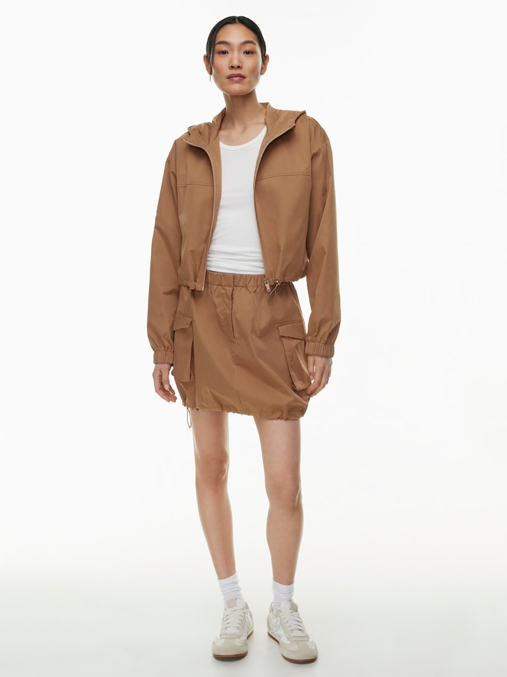 Aritzia Babaton Wilde Jacket
Slick matte twill hooded windbreaker